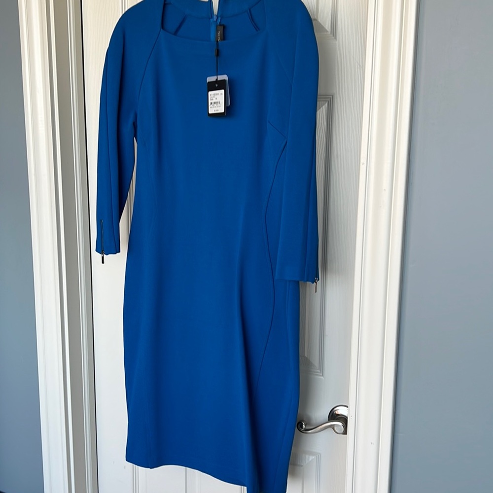 St. John knit 3/4 sleeve sheath dress. Size 14. New with tags. Tahoe blue color.